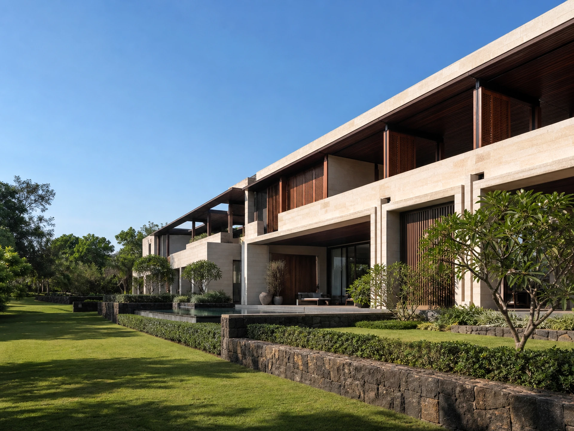 Modern terrace apartments with green plants, flowering vines, and outdoor seating on a sunny day.